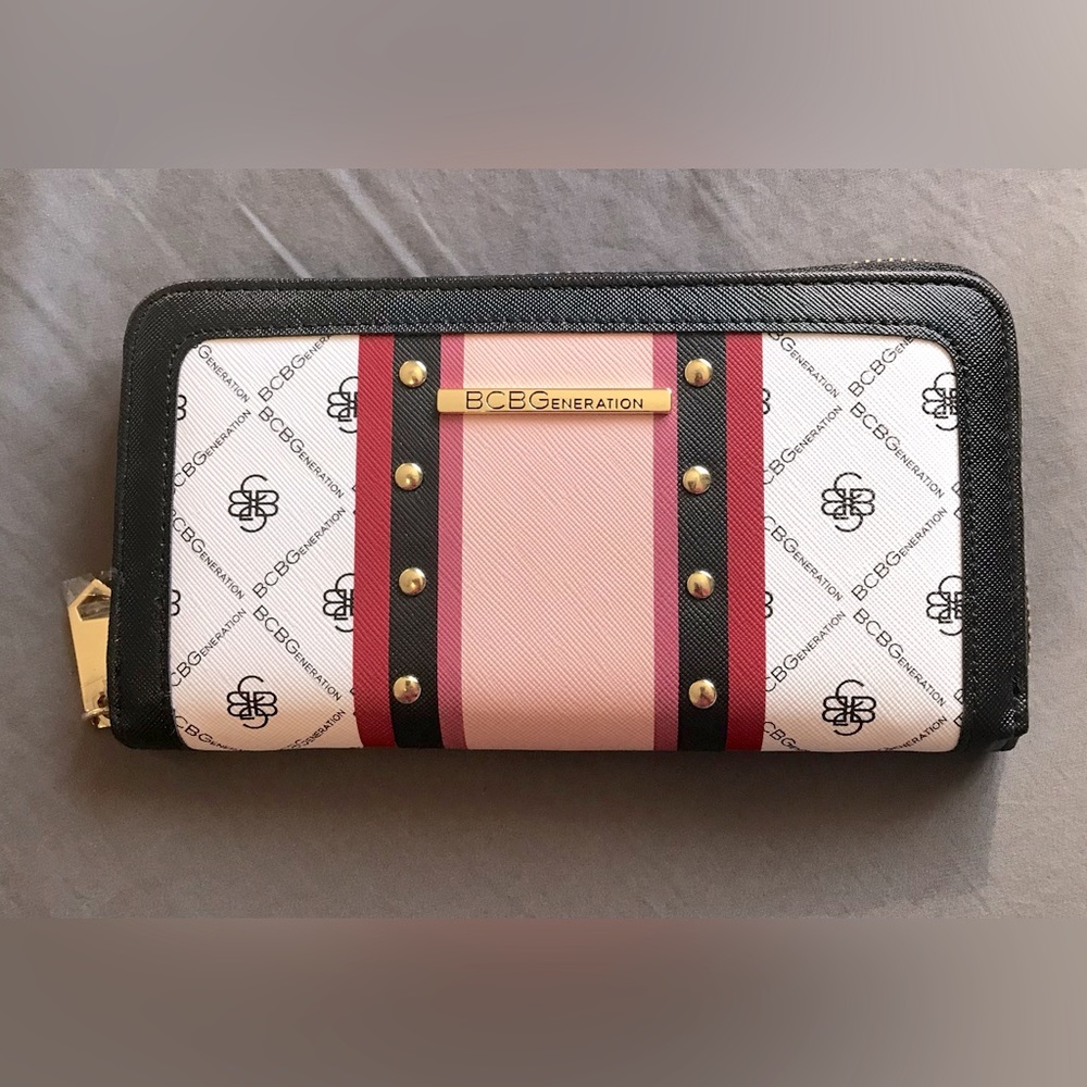 New-BCBG wallet  -black with gold,pink and white accents